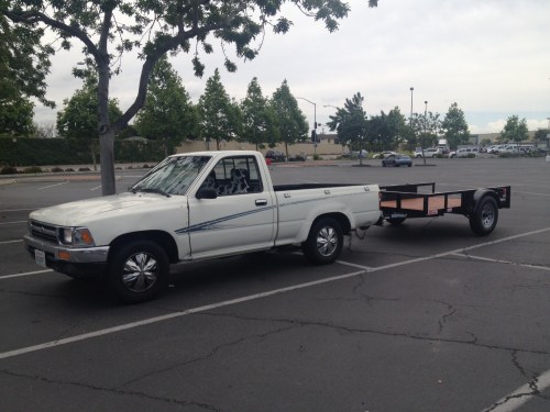 Baby Fluxie, pulled by Doris the Truck. Doris is a snappy dresser, as you can see by her seat covers.